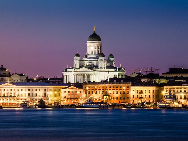 Photo_of_Cathedral_Near_Buildings_and_River